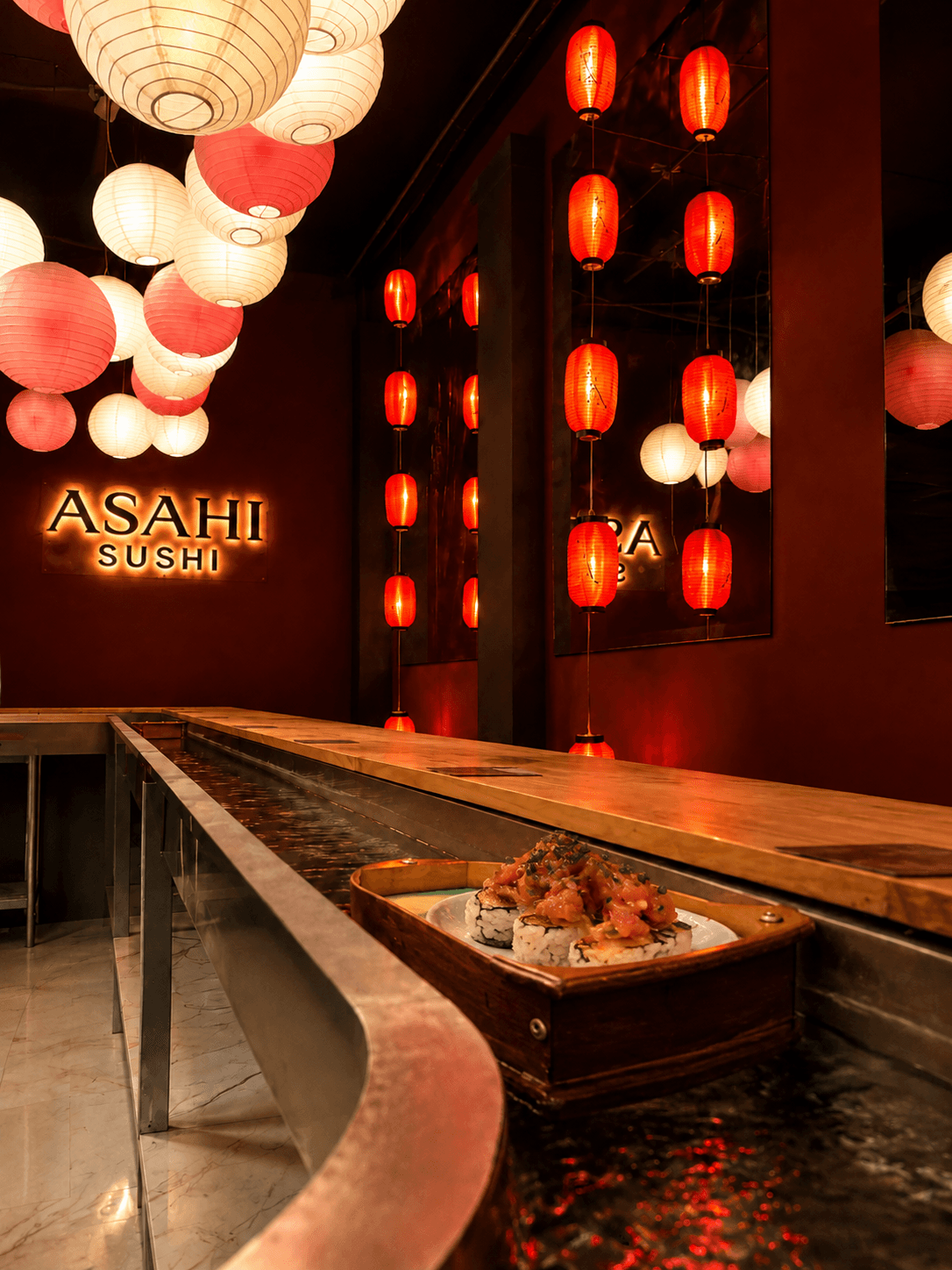 Asahi Sushi en Barranquilla — restaurante japonés con barcos de sushi